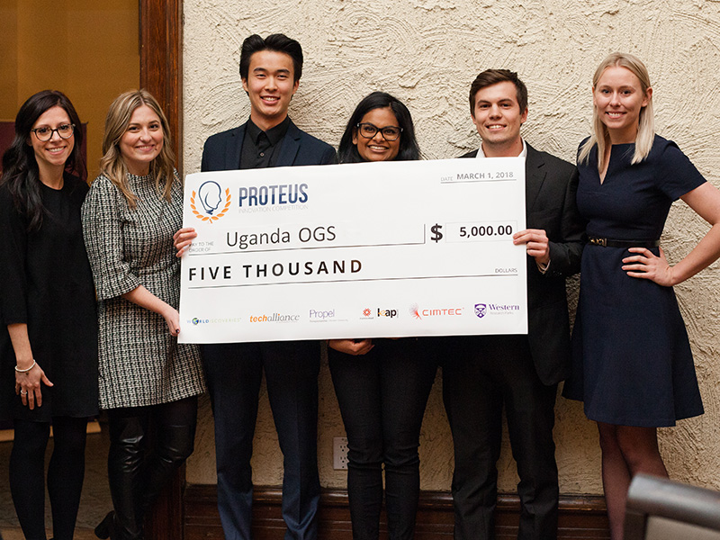 Proteus winning team with big cheque